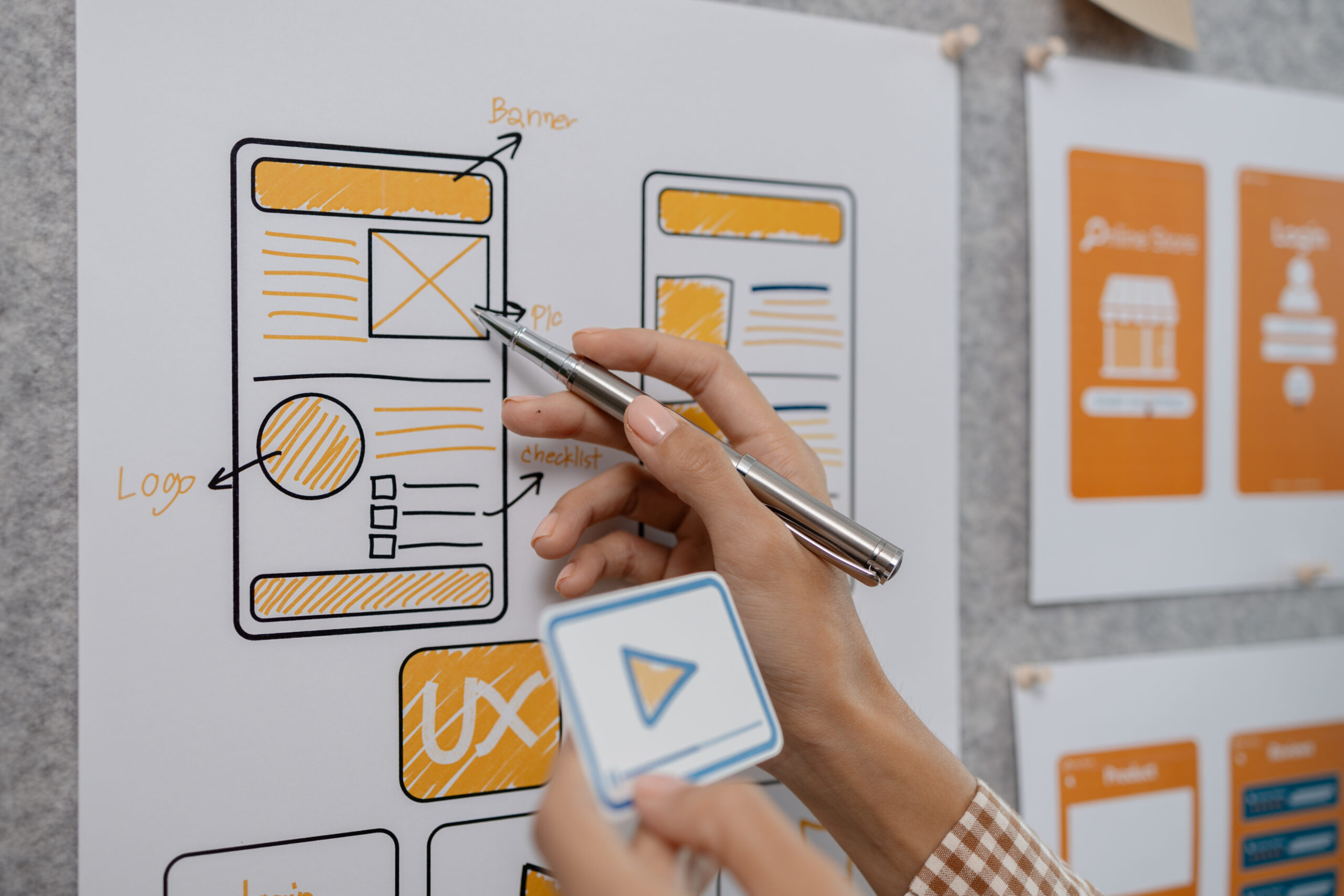 ux developer and ui designer brainstorming about mobile app interface wireframe design in the office, website designer, creative planning phone app development template